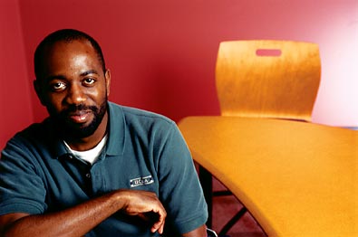Man beside table photo